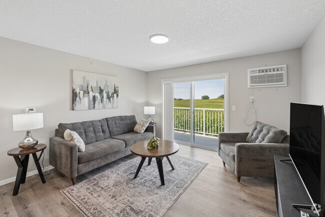 2BR, 2BA - 936SF - Living Room - Winsted Fields Apartments