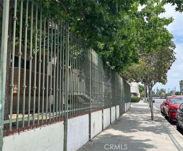 Building Photo - 6255 Woodman Ave Unit 201