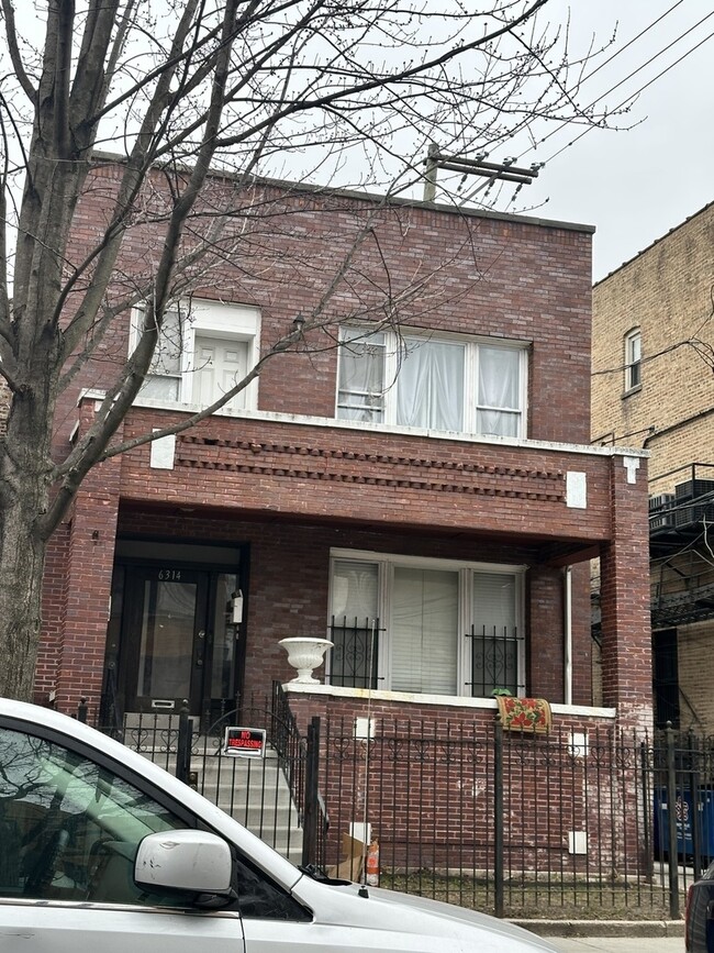 Building Photo - 6314 S Artesian Ave Unit 1