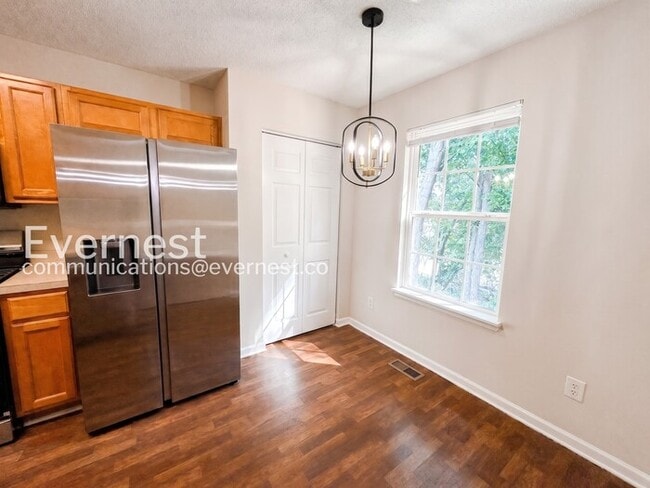 Photo - 4 Bed/3 Bath Home with Fenced Yard & Garage / Available Now!