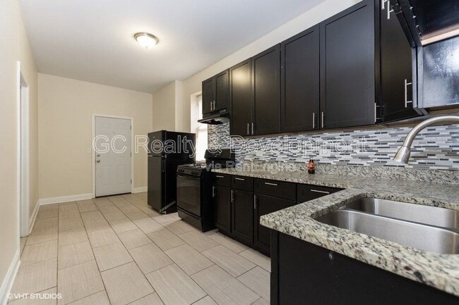 Photo - 7642 S Normal Ave Unidad 1