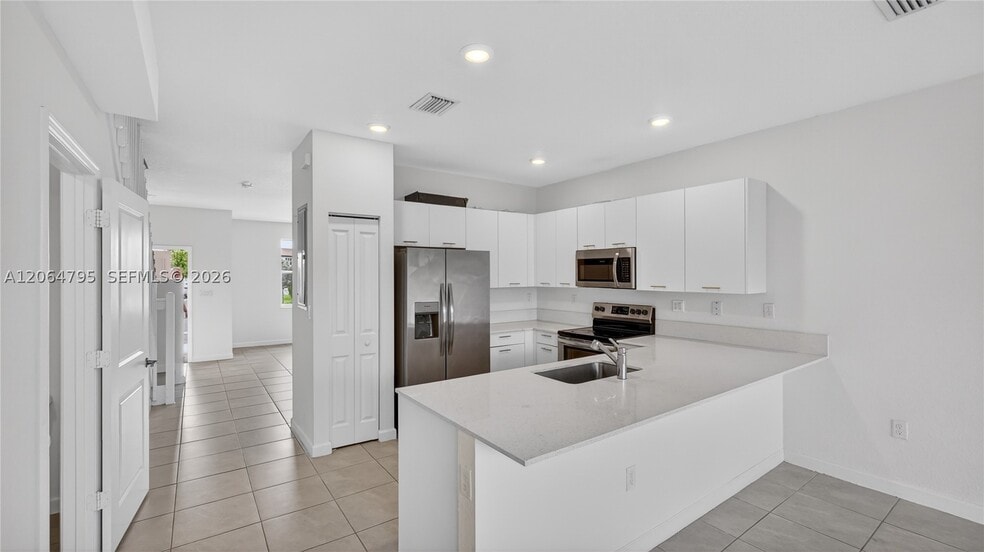 12123 NW 23rd Ct