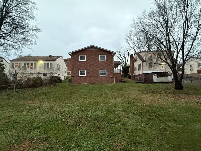 Photo - Updated 4BR Home with Finished Basement & Level Yard