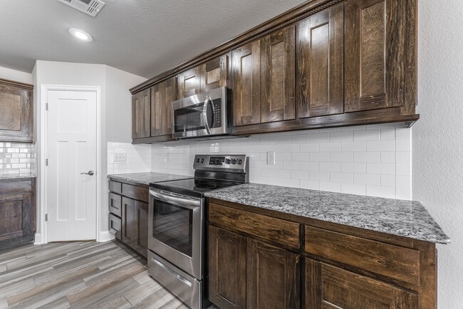 Photo - Spacious 4-Bedroom Home with Open Layout & Fenced Backyard in Pea Ridge