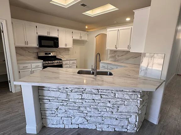 Photo - "Charming 3-Bed Oasis with Cozy Fireplace on Lighthouse Dr, Bakersfield!"