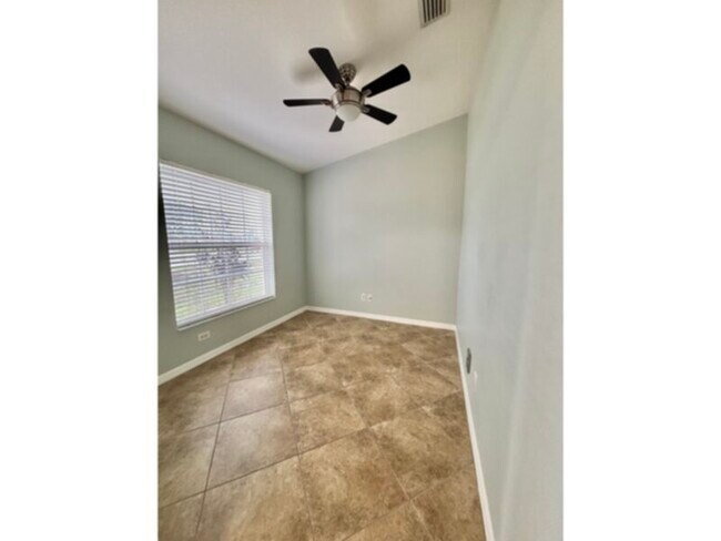 Photo - Move-In Ready! 4 Bedroom 2.5 Bath- Cape Coral Home!