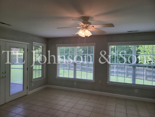 Photo - Charming 3BR Home with Bonus Room, Screened Deck & Two-Car Garage