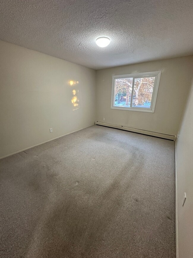 Building Photo - 4507-244 44 Ave Unit 203