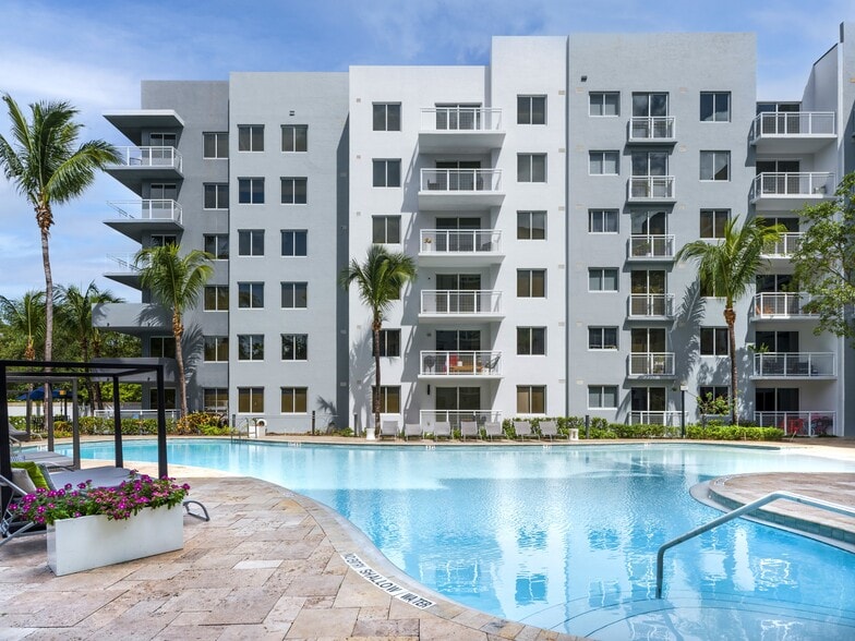 The exterior repaint finished in 2025, and the pool deck was redone with it.