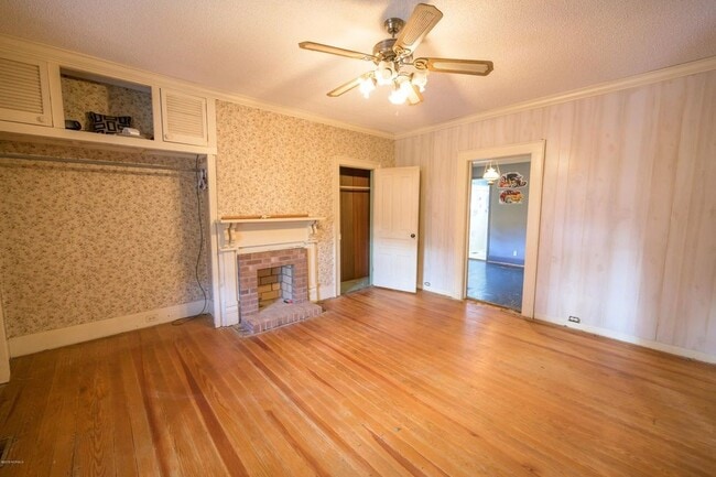 Large bedroom with fireplace (non functioning) and nice closet space. - 733 Falls Rd