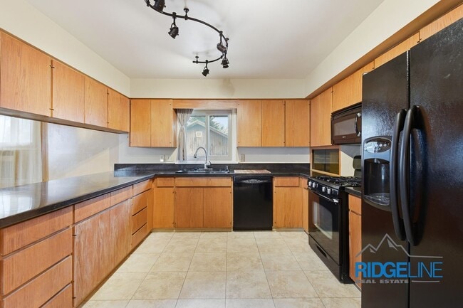 Photo - Sunnyside single family home with oversized 2 car garage