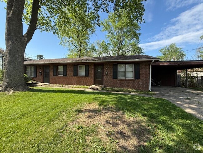 Building Photo - Brick Duplex with Fenced Yard on a Quiet S... Rental