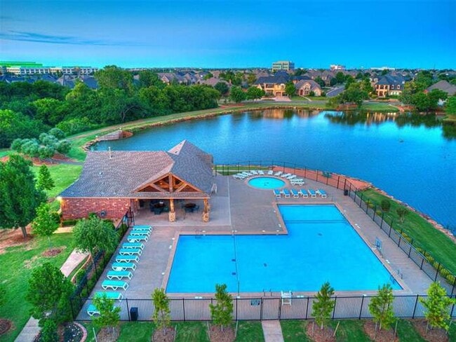 Building Photo - Beautiful Home in a Desirable Gated Northwest OKC Community with Neighborhood Lake! *More photos ...
