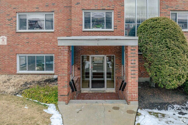 Entrada del edificio - The Summit House