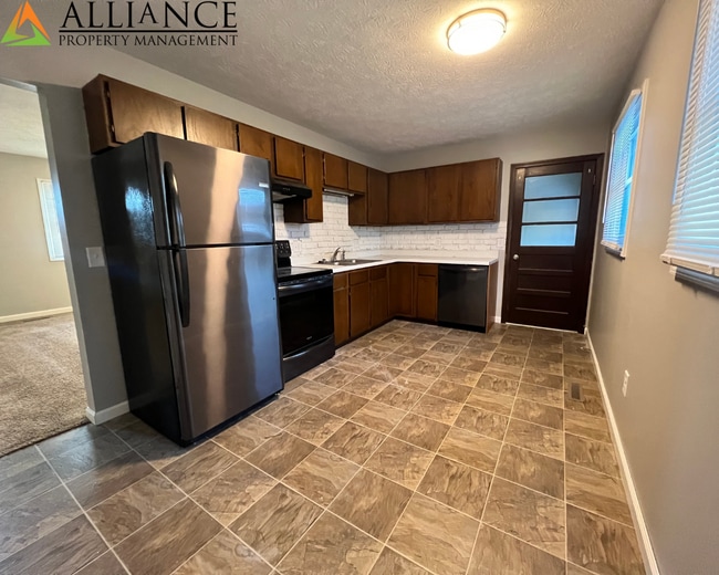 Photo - Lovely Home ~ Fenced Yard