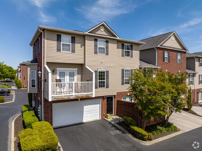 Attached 2-Car Garages, as shown on a Lincoln floorplan. - The Villas of Emerald Woods Townhomes