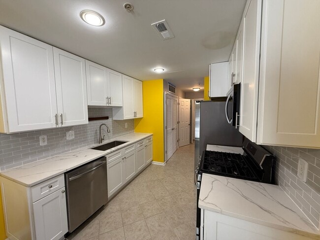 Photo - Spacious 2-Level Condominium