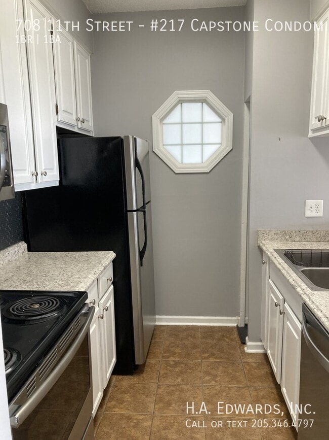Building Photo - 708 11th St Unit #217 Capstone Condominiums