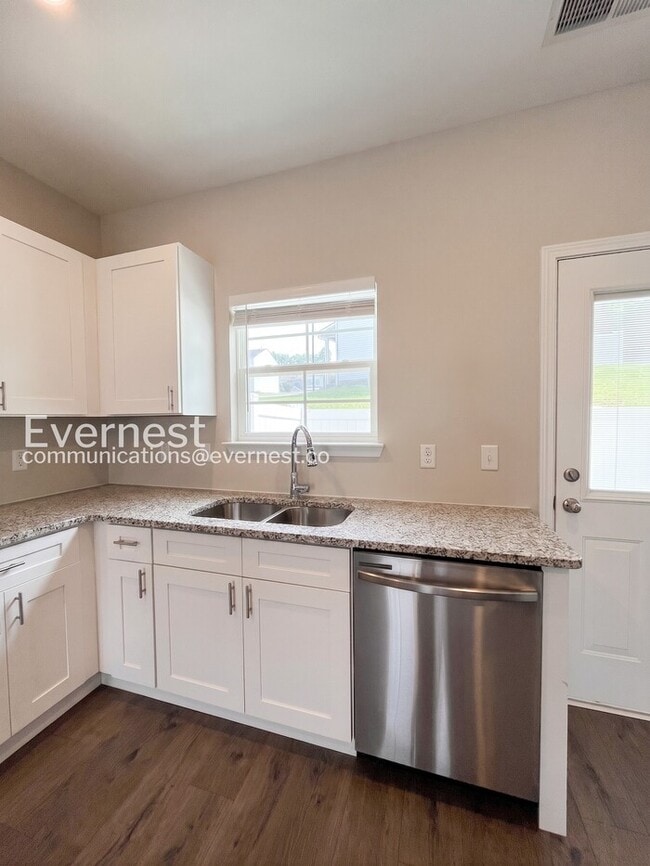Photo - 2-Bed/3-Bath Townhouse with Modern Amenities/ Pet-Friendly /Available Now!