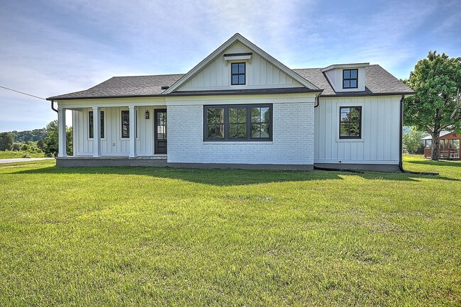 Building Photo - Updated and restored Original Farm House Style