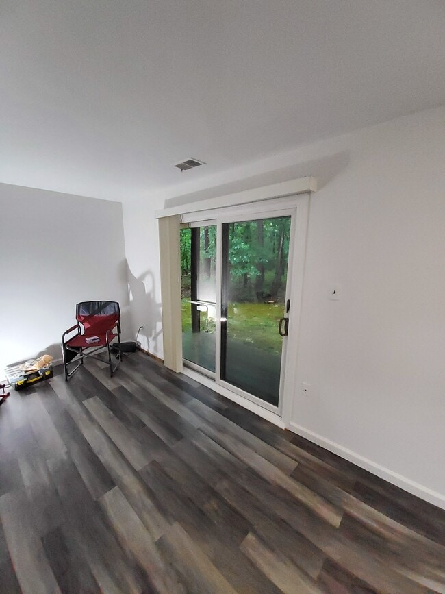 covered patio - facing woods - 23 Stratton Ct Unit 23