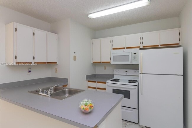 Photo - 18304 NW 68th Ave Unit L