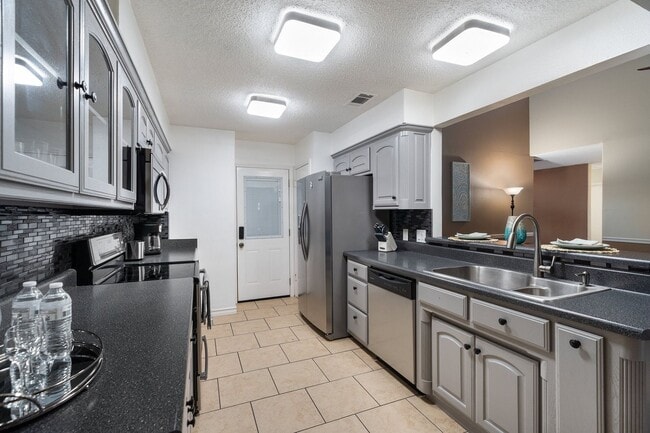 Photo - Captivating 3-Bedroom Escape with Private Deck & HOA Pool Access in Grand Prairie!