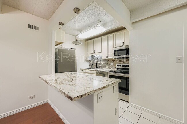 Photo - 8060 E Girard Ave Unidad 101