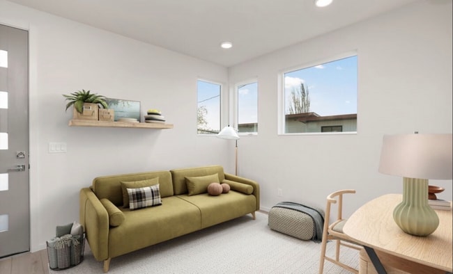 Espacio diáfano con abundante luz natural y posibilidad de uso flexible. - 2921A Franklin Ave E Unidad The Eastlake Perch