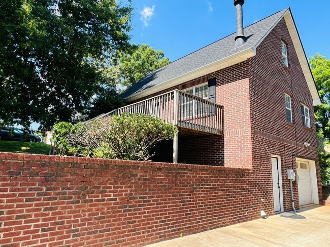 Photo - Unit is no longer available - application approved.  Charming 1 1/2 story brick home with basemen...