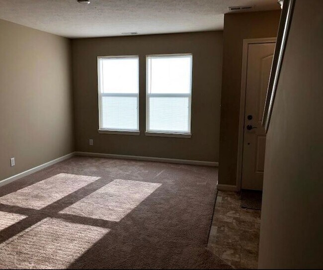 Photo - Spacious 4-Bedroom Home with Loft, Fenced Backyard & Modern Finishes