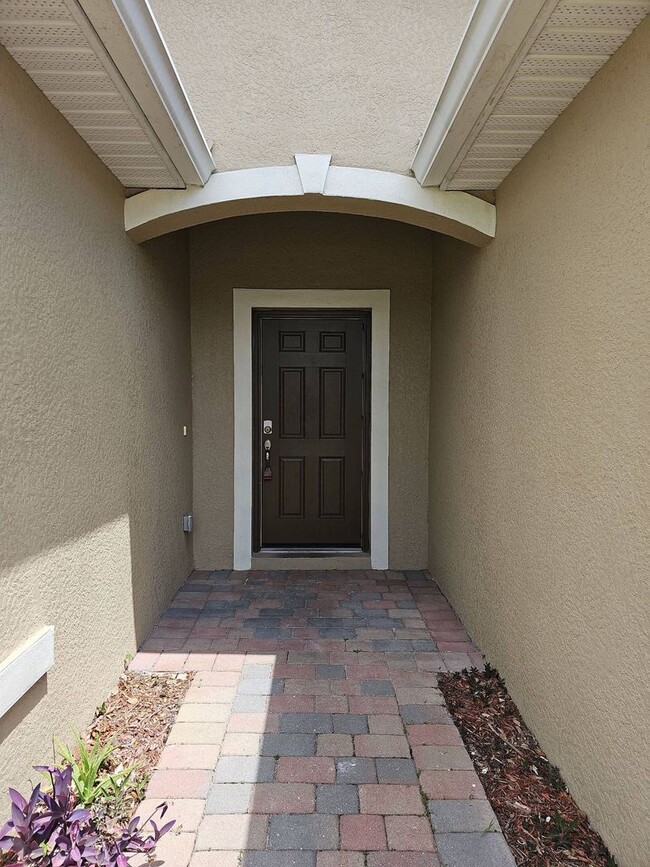 Photo - Nice 3 bed 2 bath 2 car garage single family home in Cape Coral with lawn care included.