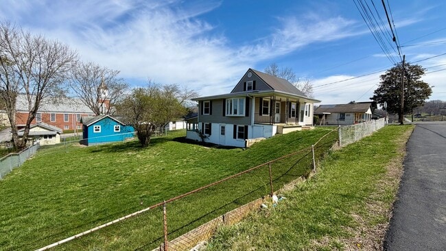 Photo - Spacious Updated 5BR Home with Flexible Living Options