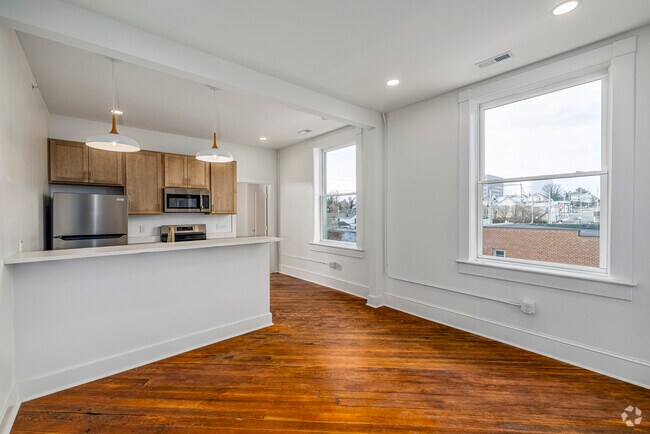 2BR, 2BA - 757SF - Living Room - The Humbles Building