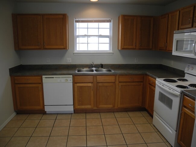 Photo - Condominium in Academy Commons Unit D