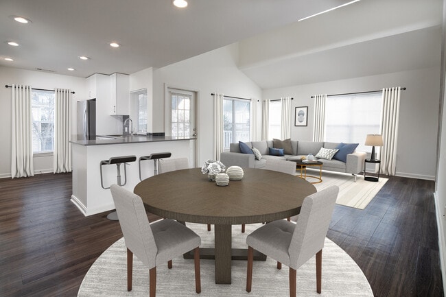 Kitchen, living, and dining areas with hard-surface flooring