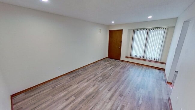 Photo - Updated 2BR/1BA duplex with office in partially finished basement, detached garage and across fro...