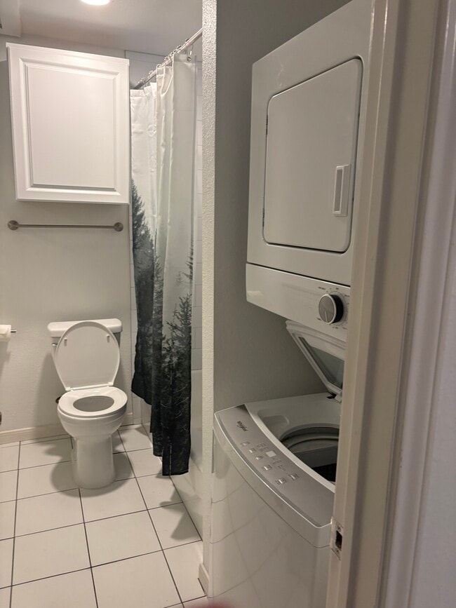 Washer dryer in bathroom - 4209 Marathon Blvd Unit 102