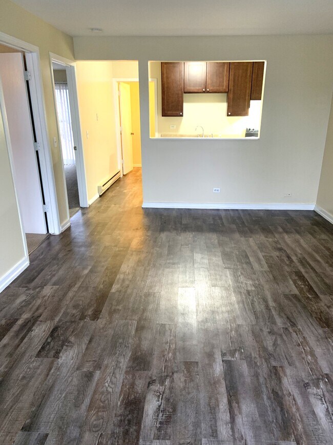 living room towards kitchen - 424 Wisconsin St Unit 424 S. Wisconsin St