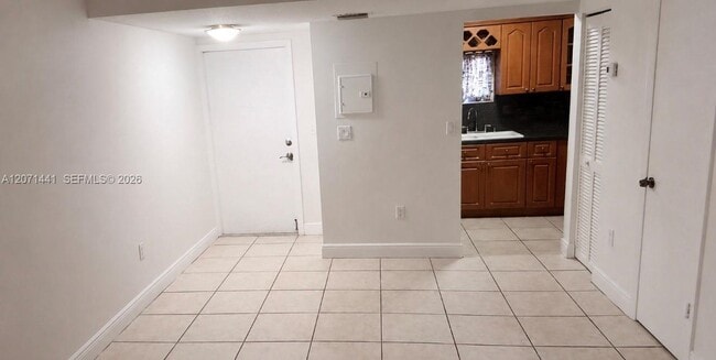 Building Photo - 5611 W 25th Ct Unit 14-A