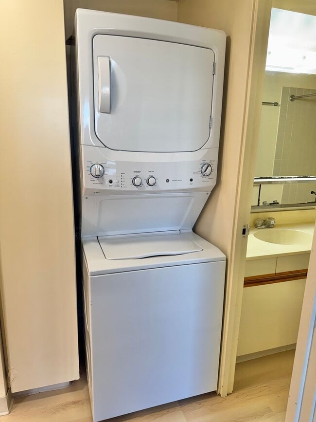 Photo - Charming 2 bed, 2 bath, with 1 secured covered parking stall and In-Unit Washer/Dryer. Available ... Unit 201