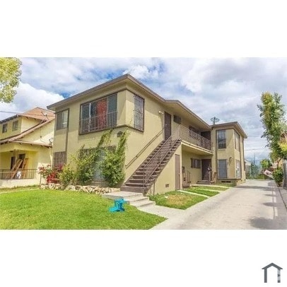 Building Photo - Charming 2-Bed Townhouse with Private Balc... Unit 1