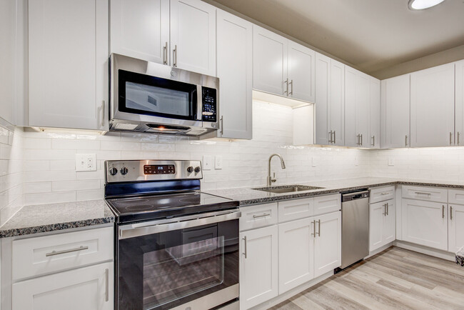 Newly Renovated Kitchen - Cortland Belmar Apartments