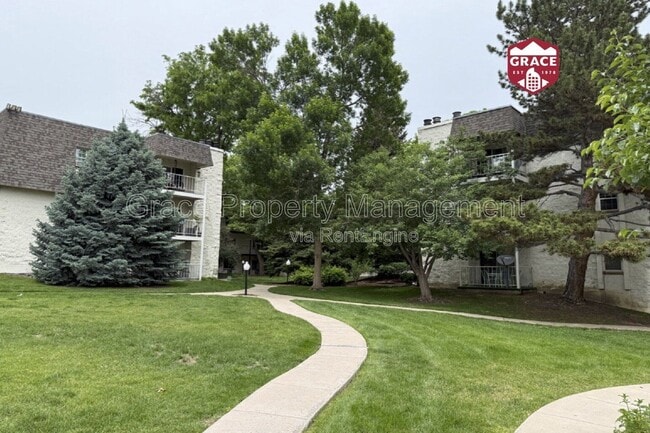 Building Photo - 5770 E Warren Ave Unit 206c