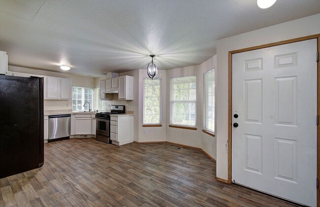 Photo - This one level charmer won't last long! 3 bedrooms, 2 baths, fully fenced yard, pets welcome!