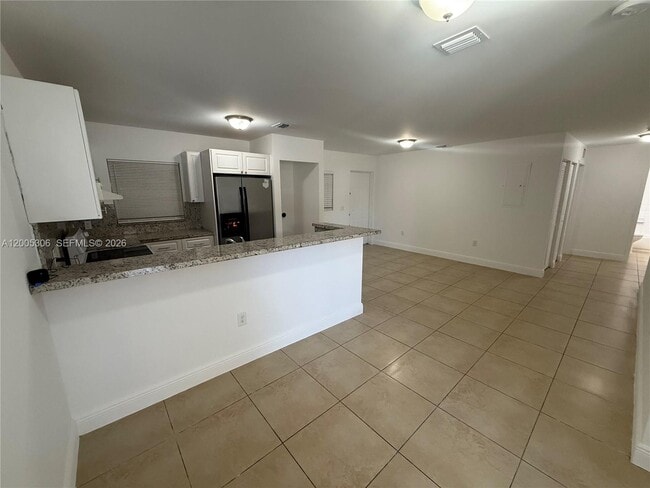 Photo - 1565 NW 47th St Unit 1