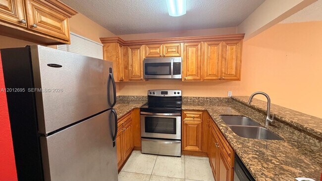 Photo - 1760 Windorah Way Unit H