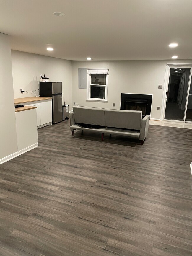Full living room with kitchenette and refrigerator - 14555 Creek Branch Ct