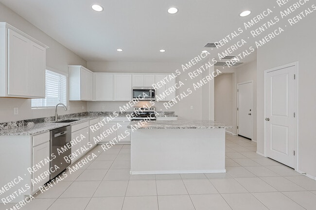 10338 W Wier Ave