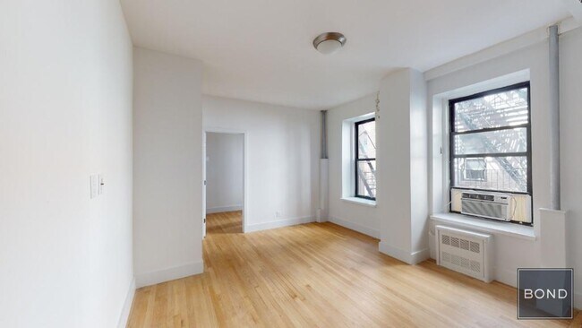 Photo - 415 E 73rd St Apartment Unit 1G